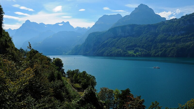 Lake Surrounded by Mountains — Blue, Serene, Afternoon, Photograph, Boat