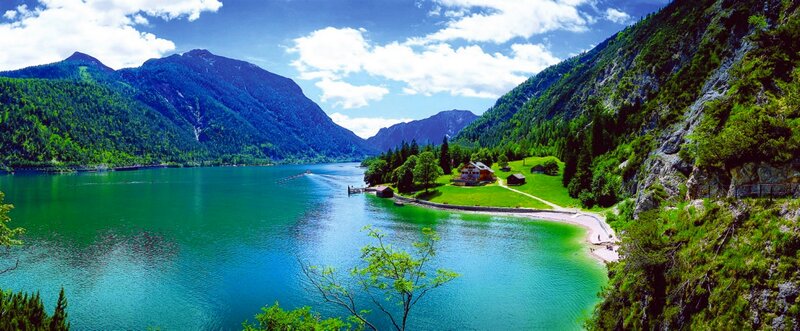Lake Surrounded by Mountains — Blue, Serene, Afternoon, Photograph, Trees, Houses