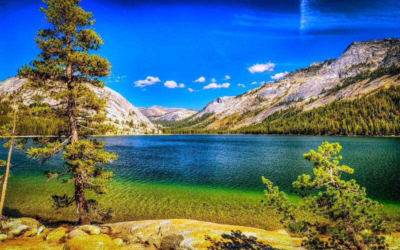 Lake Surrounded by Mountains — Blue, Serene, Afternoon, Photograph, Trees, Sky, Rocks