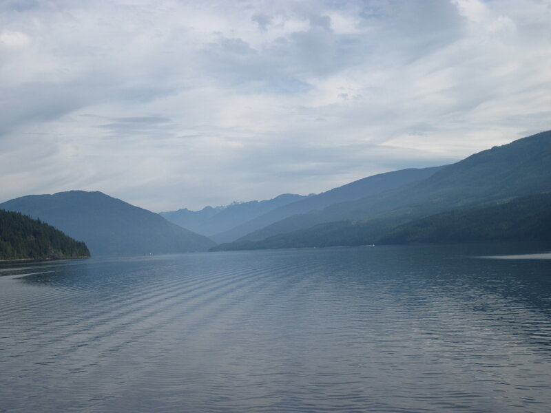 Lake Surrounded by Mountains — Blue, Serene, Photograph