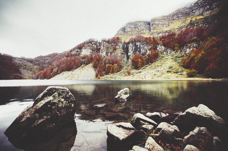 Lake Surrounded by Mountains — Brown