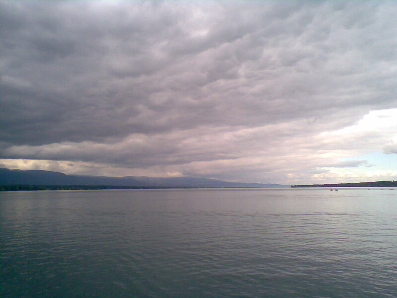 Lake under cloudy sky