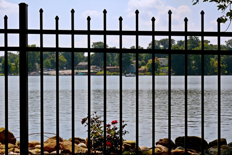 Lake View Through Fence