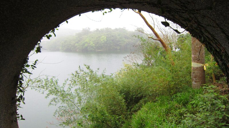 Lake Viewed Through Arch