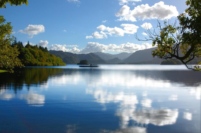 Lake with Boat and Mountains — Blue
