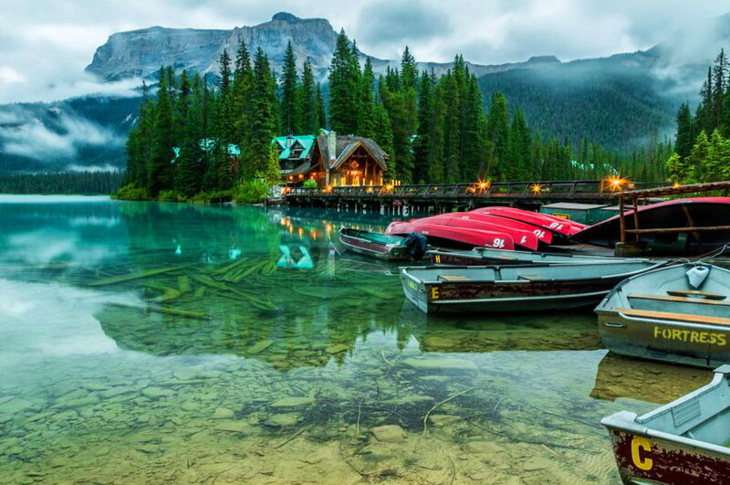Lake with Boats and Cabin