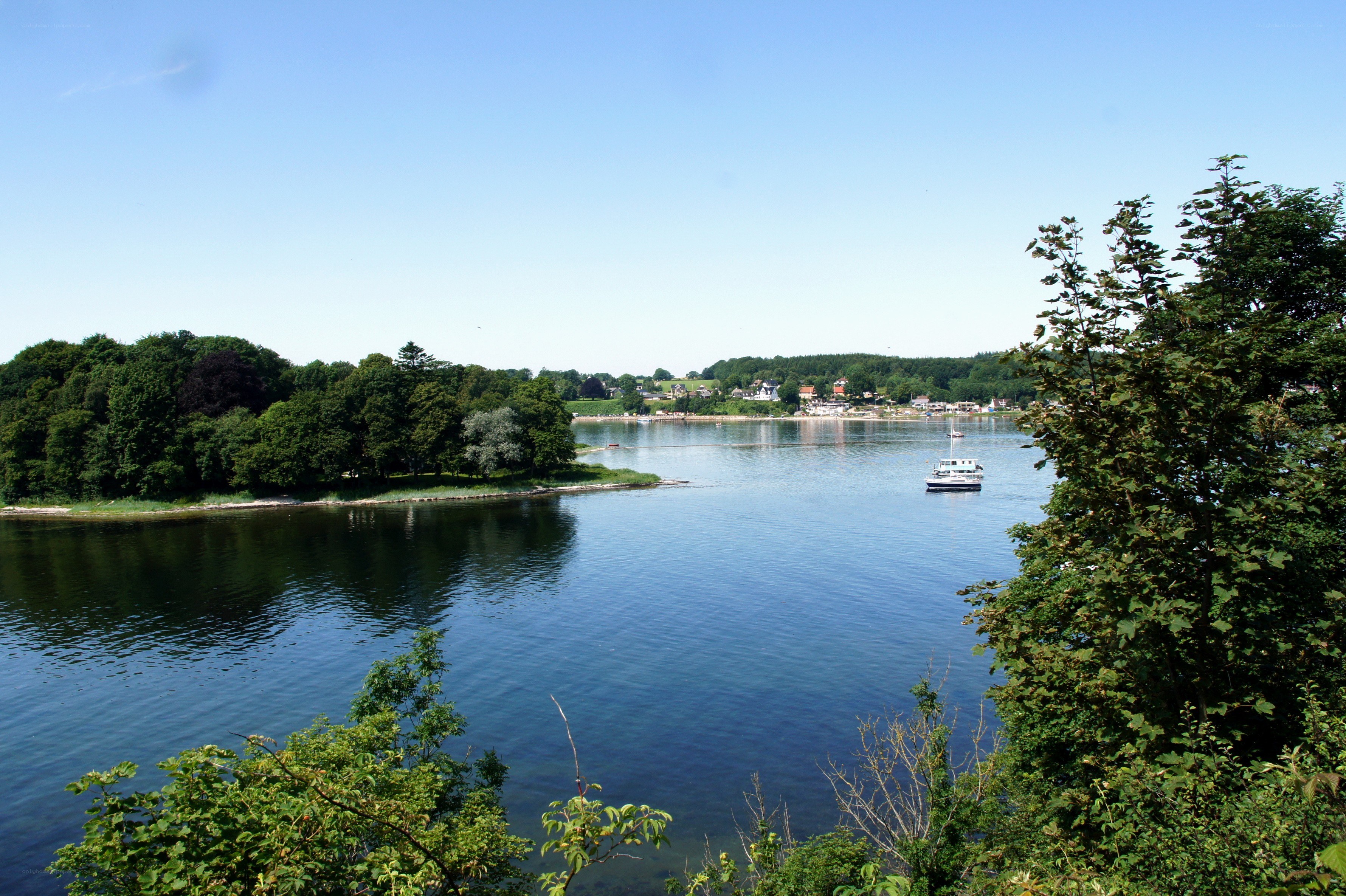 Lake with boats and trees