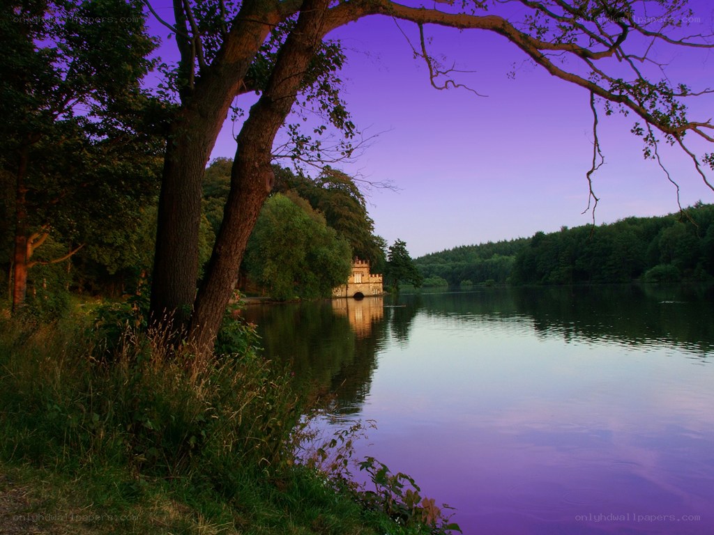 Lake with castle at dusk