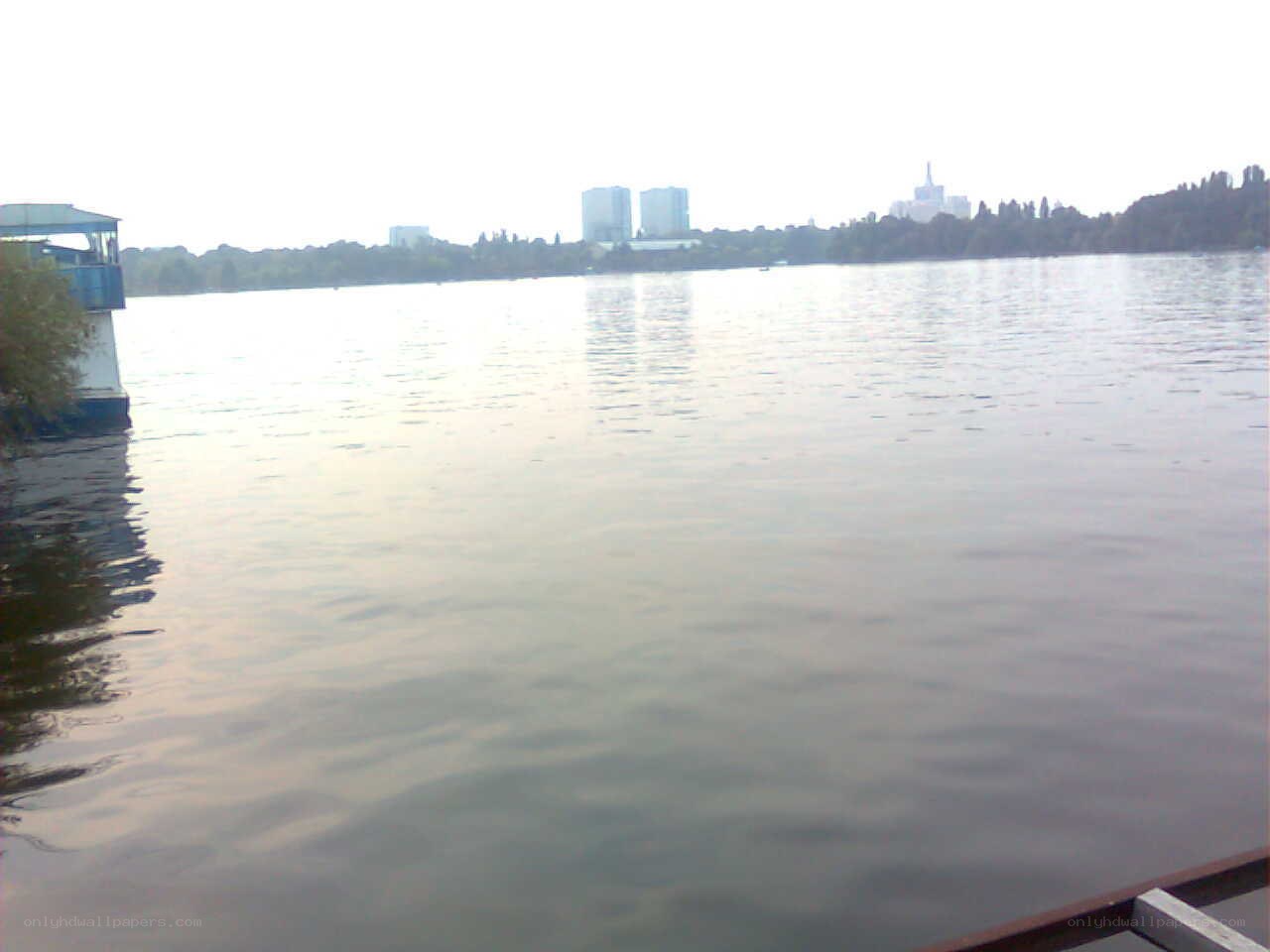 Lake with city skyline