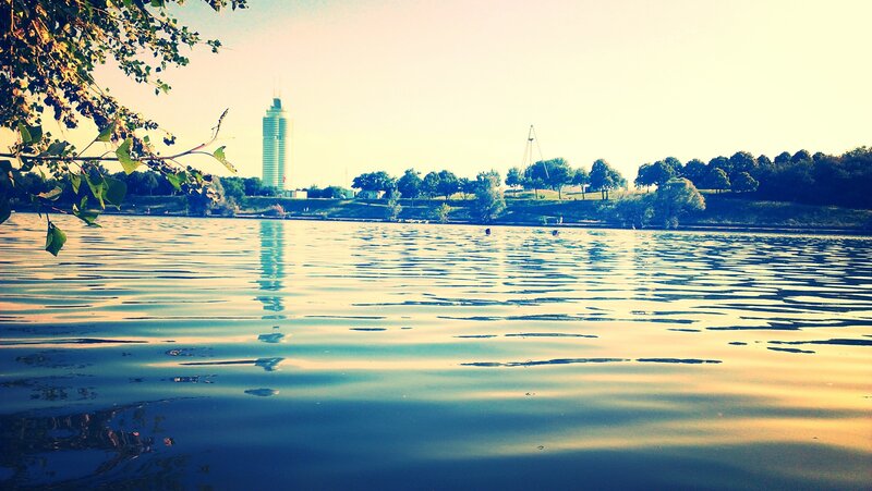 Lake with city skyline