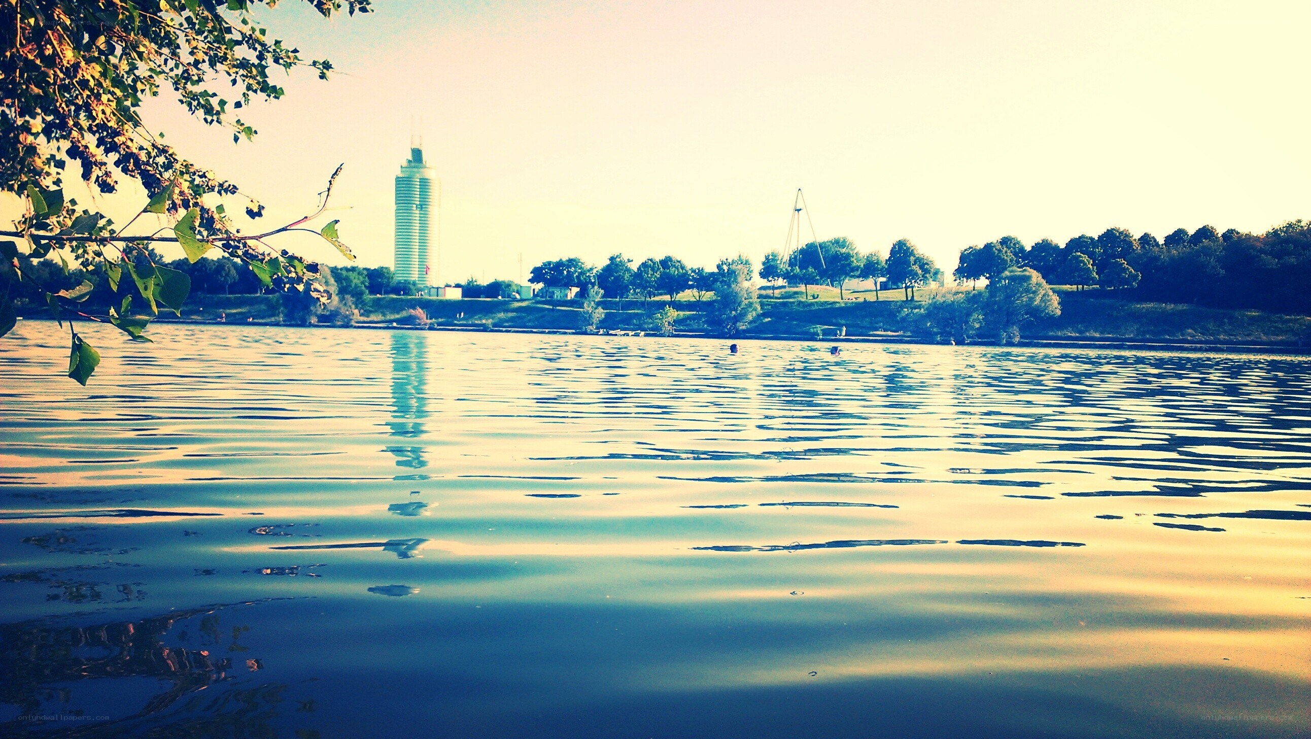 Lake with city skyline