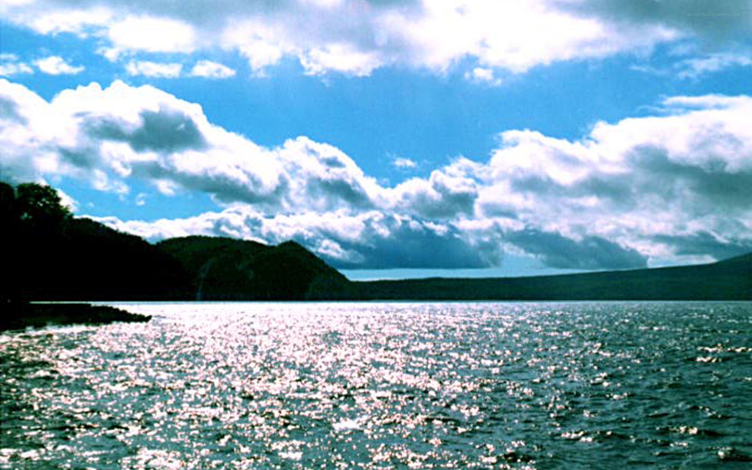 Lake with clouds and hills