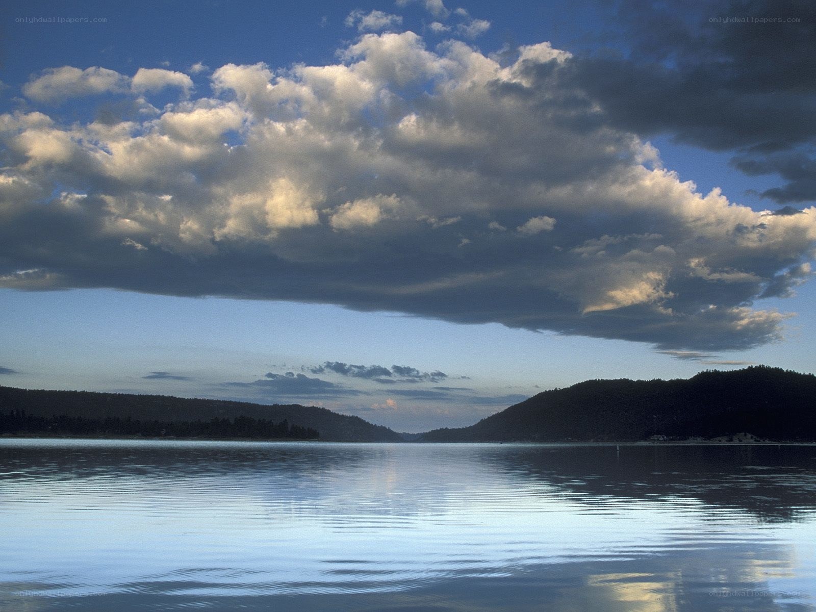 Lake with clouds and hills
