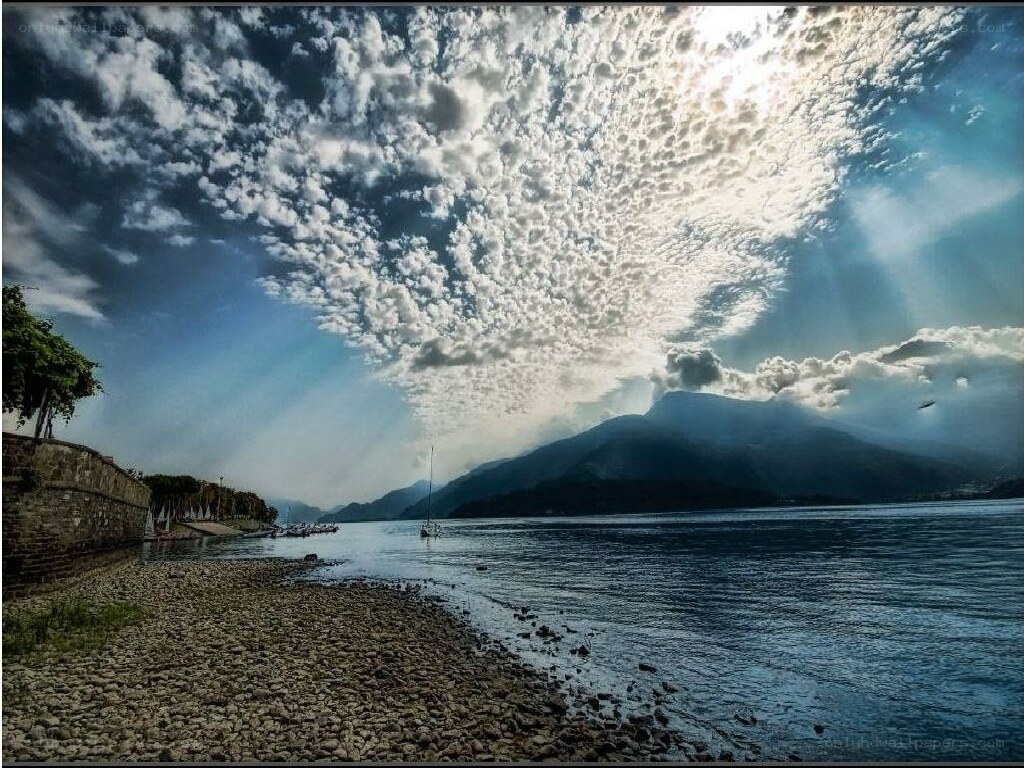 Lake with clouds and mountains