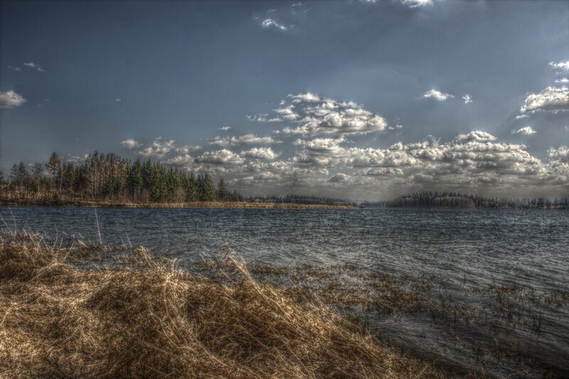 Lake with cloudy sky