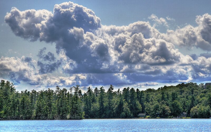Lake with forest and clouds