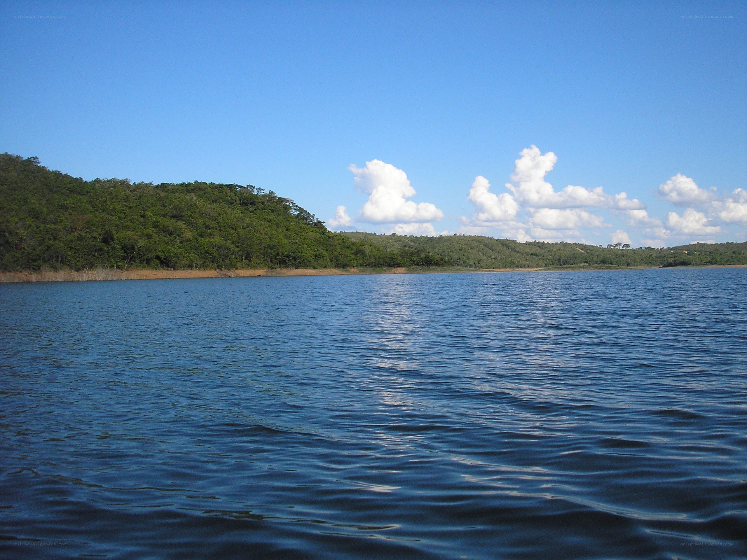 Lake with forested hills