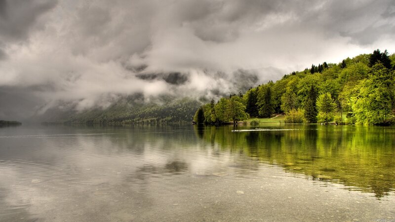 Lake with forested hills