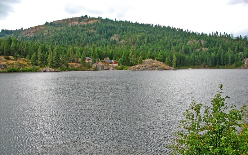Lake with forested hills