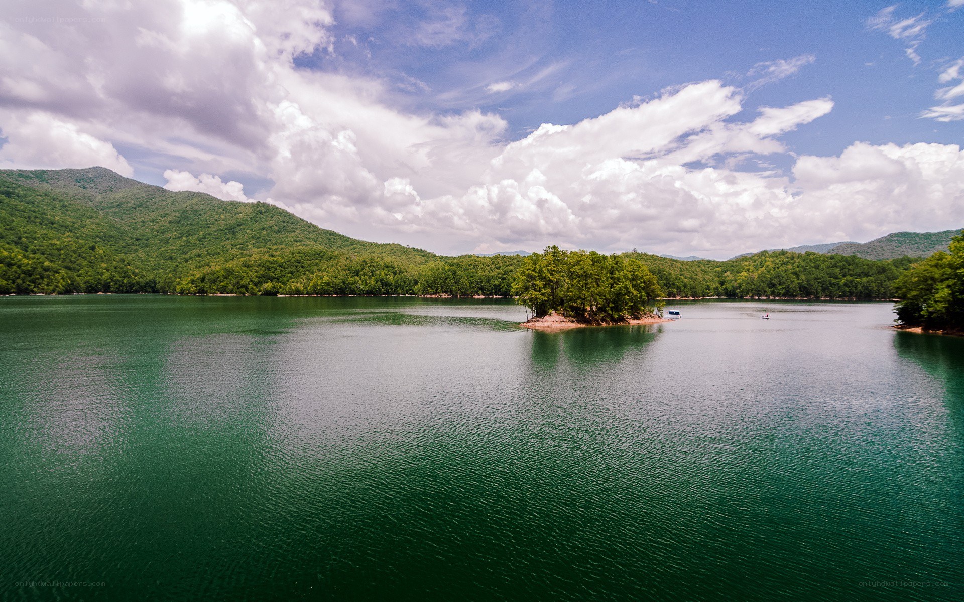 Lake with forested hills
