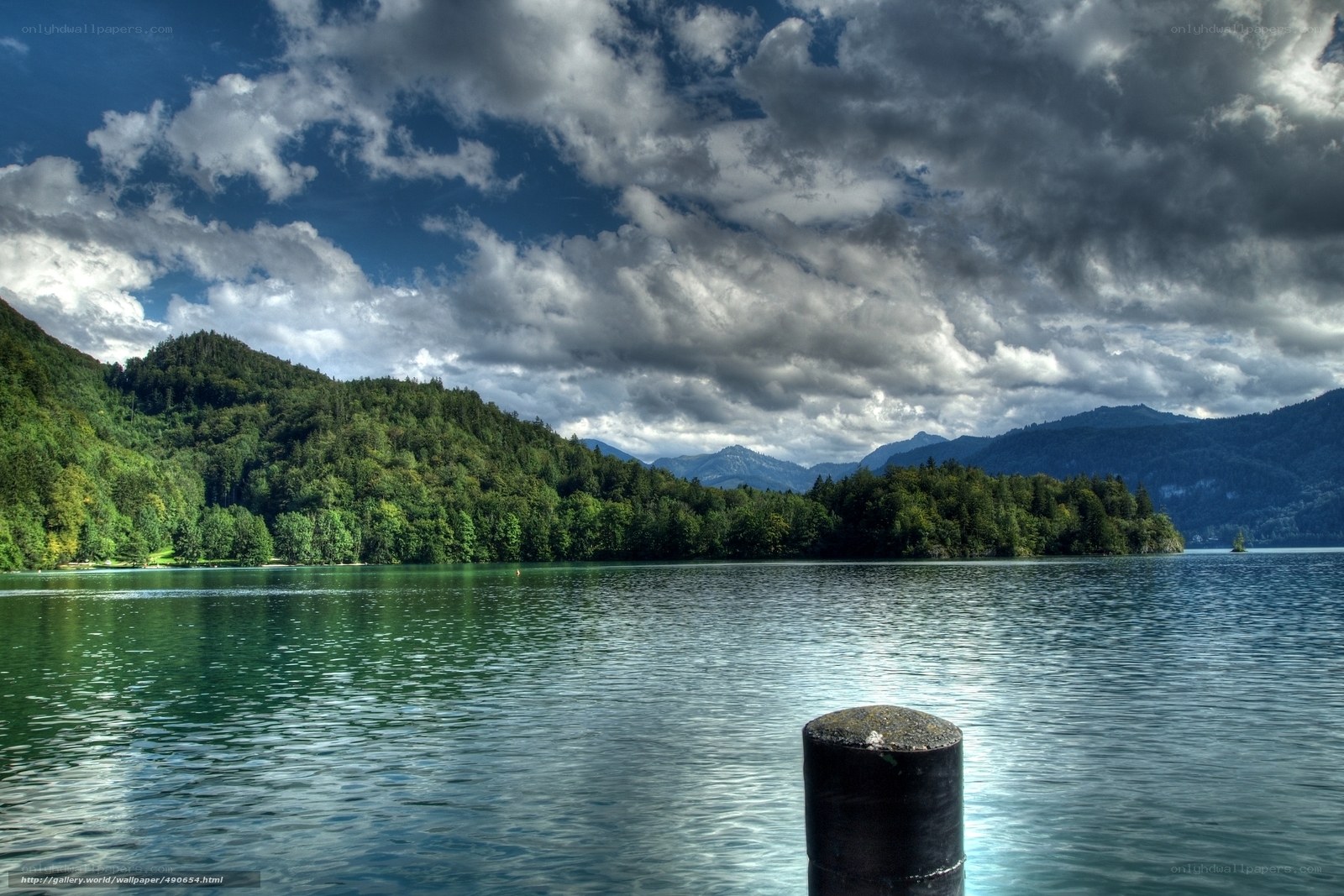 Lake with forested hills