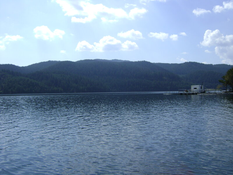 Lake with Forested Hills — Blue, Serene, Afternoon, Photograph, Dock