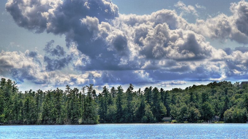 Lake with Forested Shore — Blue, Dramatic, Afternoon, Photograph, Trees