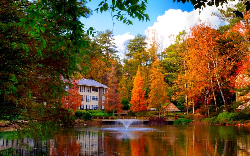 Lake with Fountain and Building