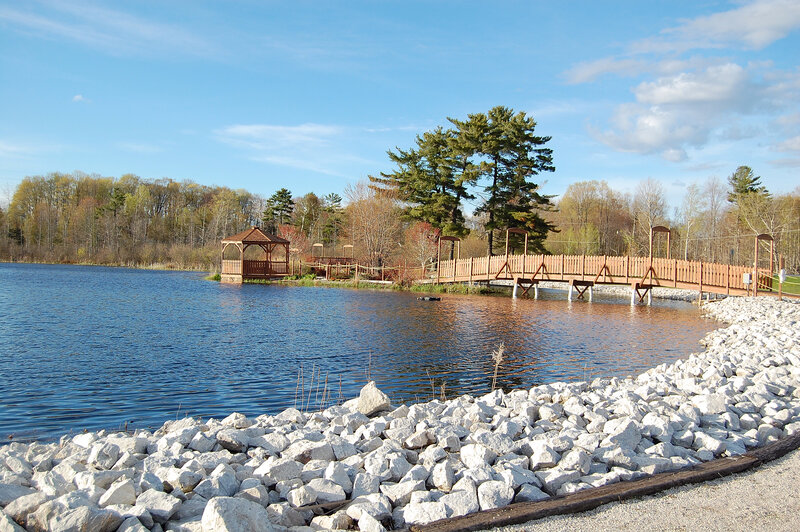 Lake with gazebo and wooden bridge
