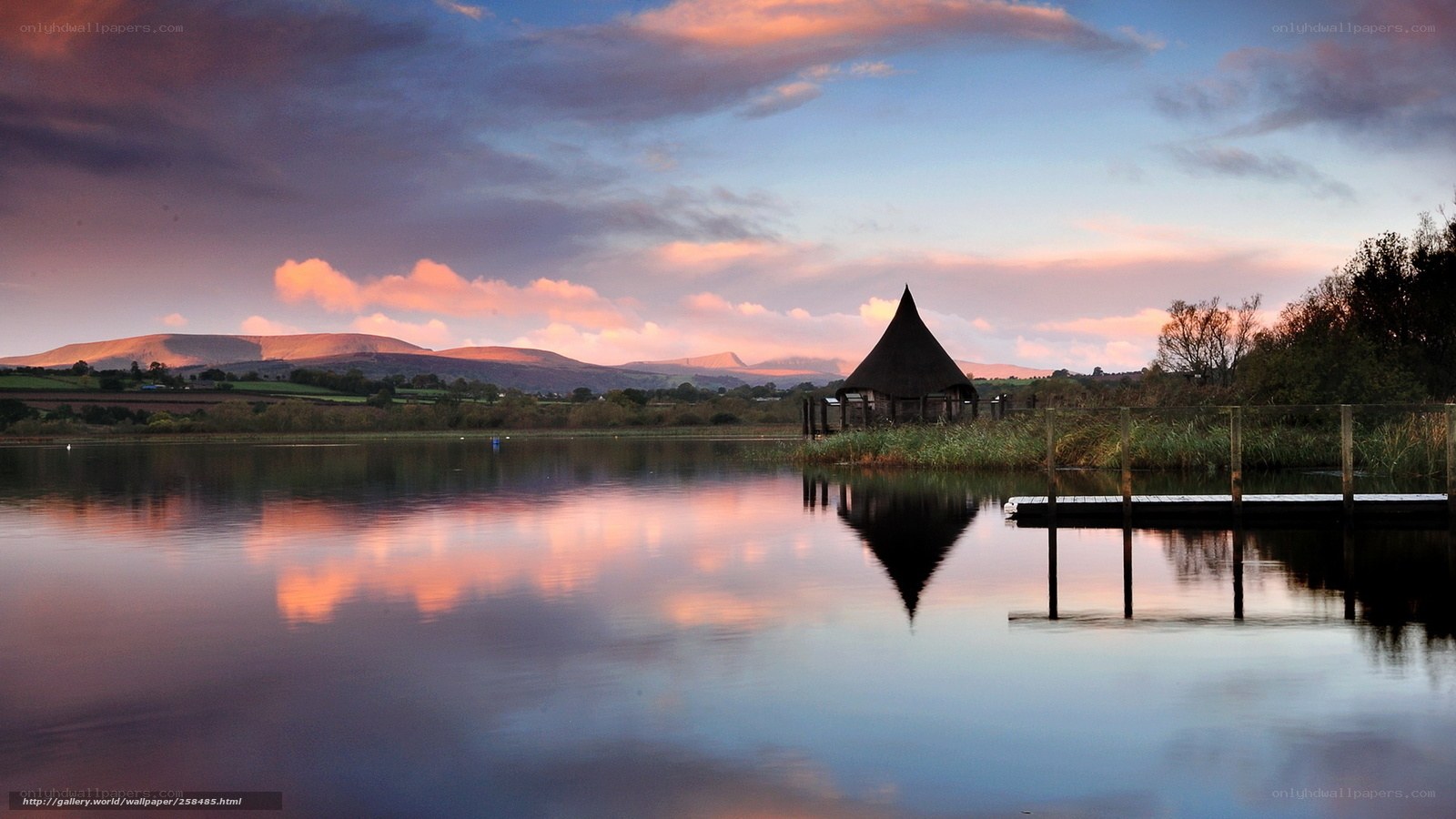 Lake with gazebo at sunset