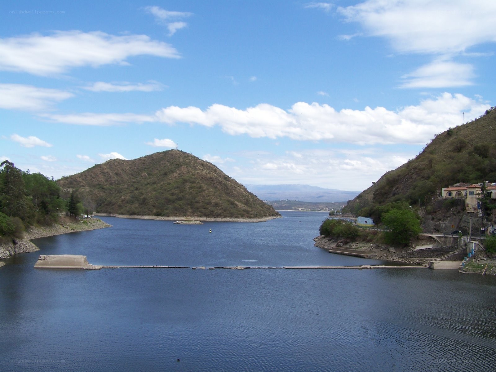 Lake with hills and dam