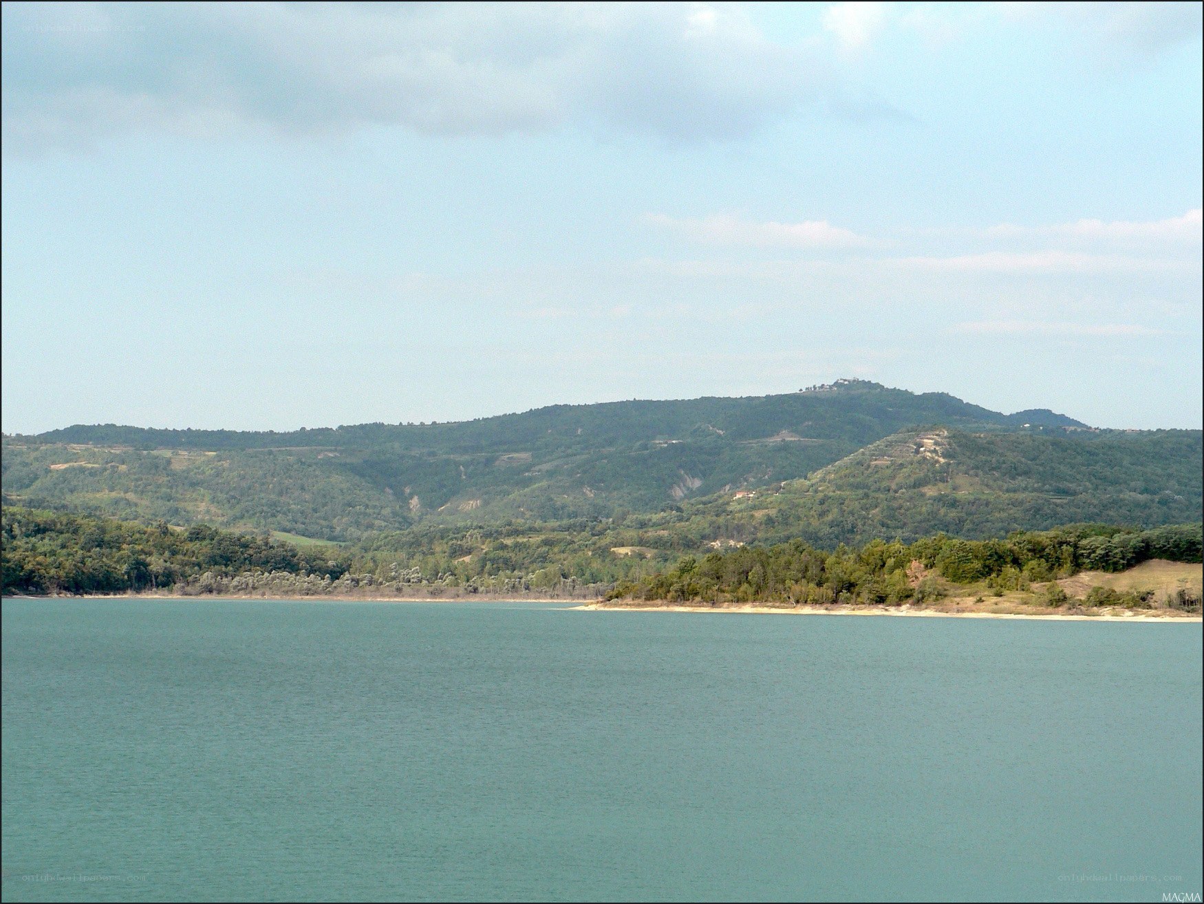 Lake with hills in the background