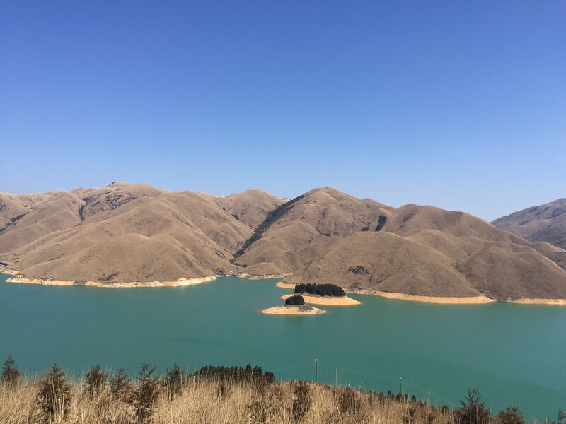 Lake with Island in Mountains