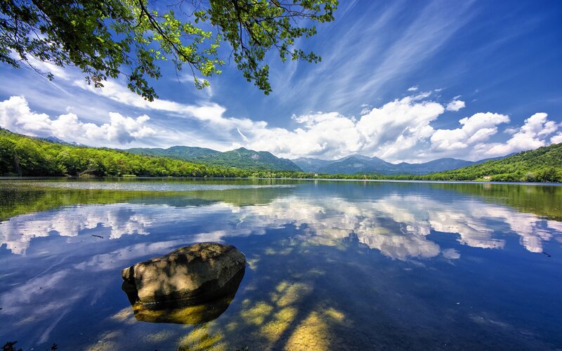 Lake with Mountain Reflection — Blue, Serene, Afternoon, Photograph, Mountains, Trees, Rock