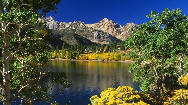 Lake with mountains and autumn trees