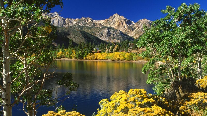 Lake with mountains and autumn trees