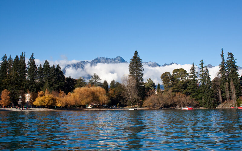 Lake with mountains and autumn trees