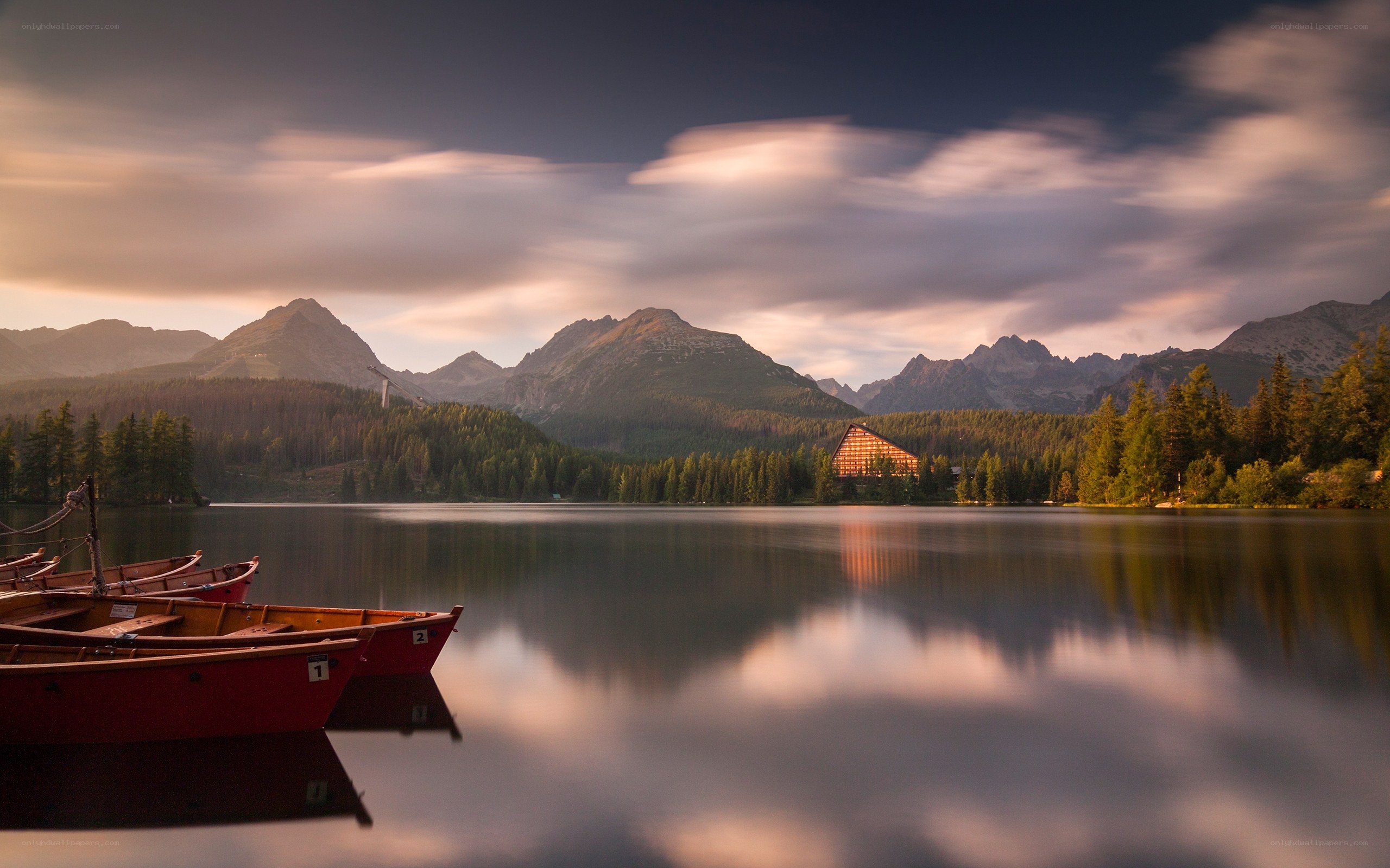 Lake with mountains and boats