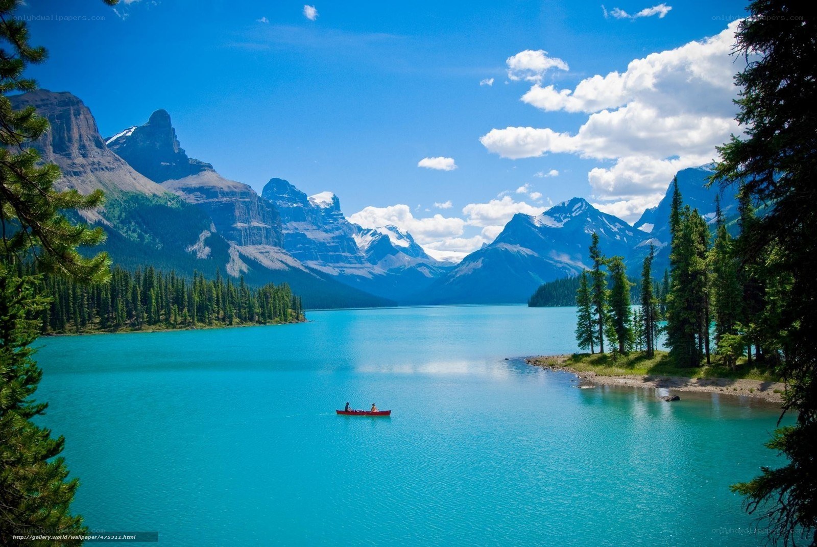 Lake with mountains and canoe