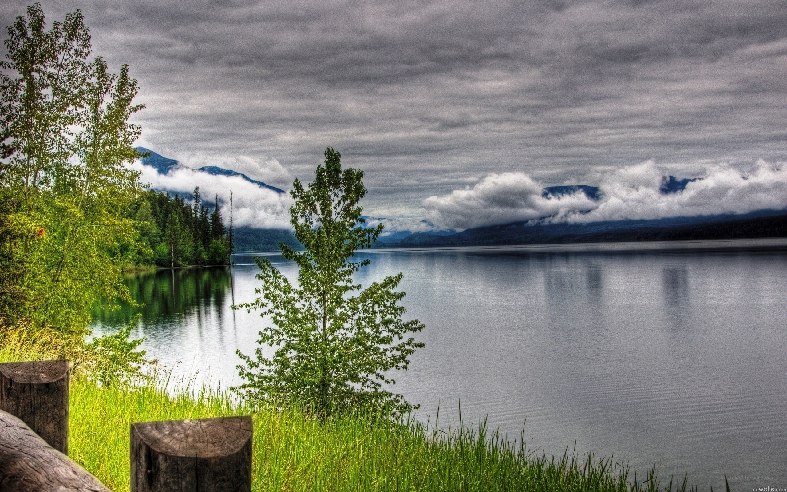 Lake with mountains and clouds