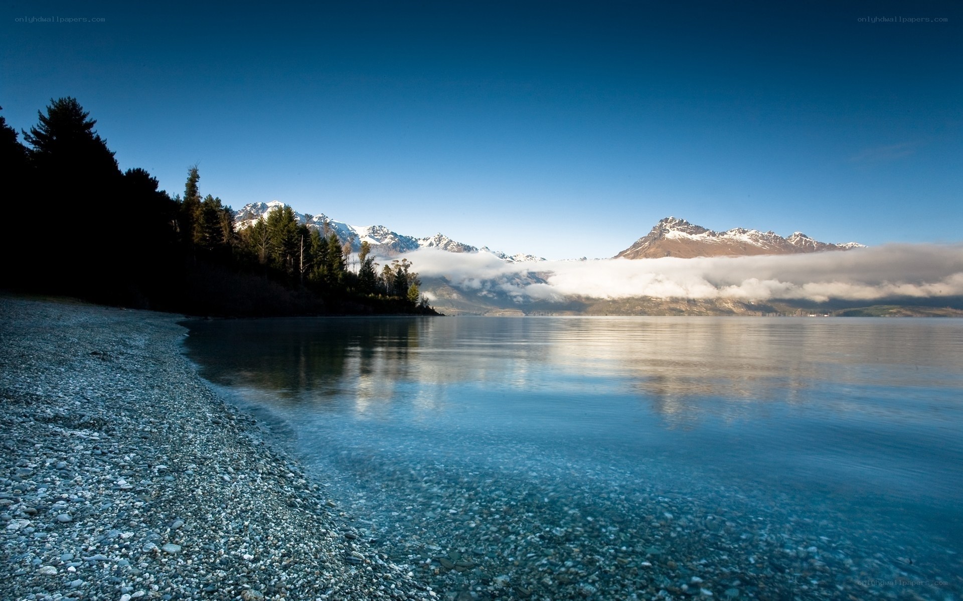 Lake with mountains and clouds