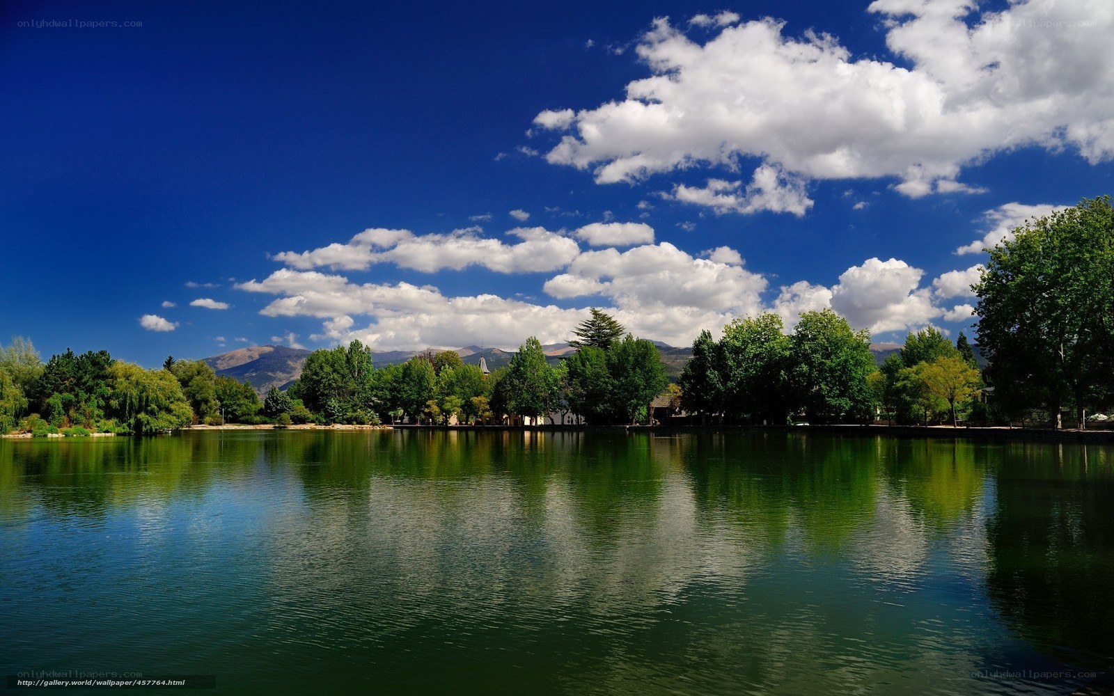 Lake with mountains and clouds