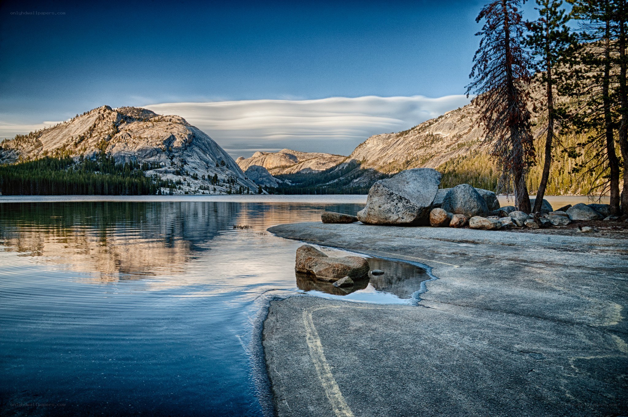 Lake with mountains and lenticular clouds