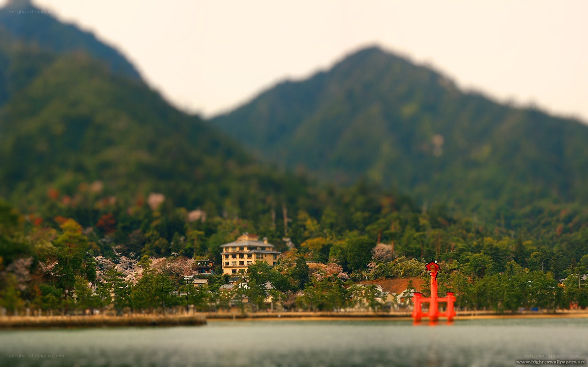 Lake with mountains and red gate