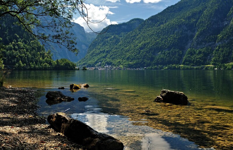 Lake with mountains and village