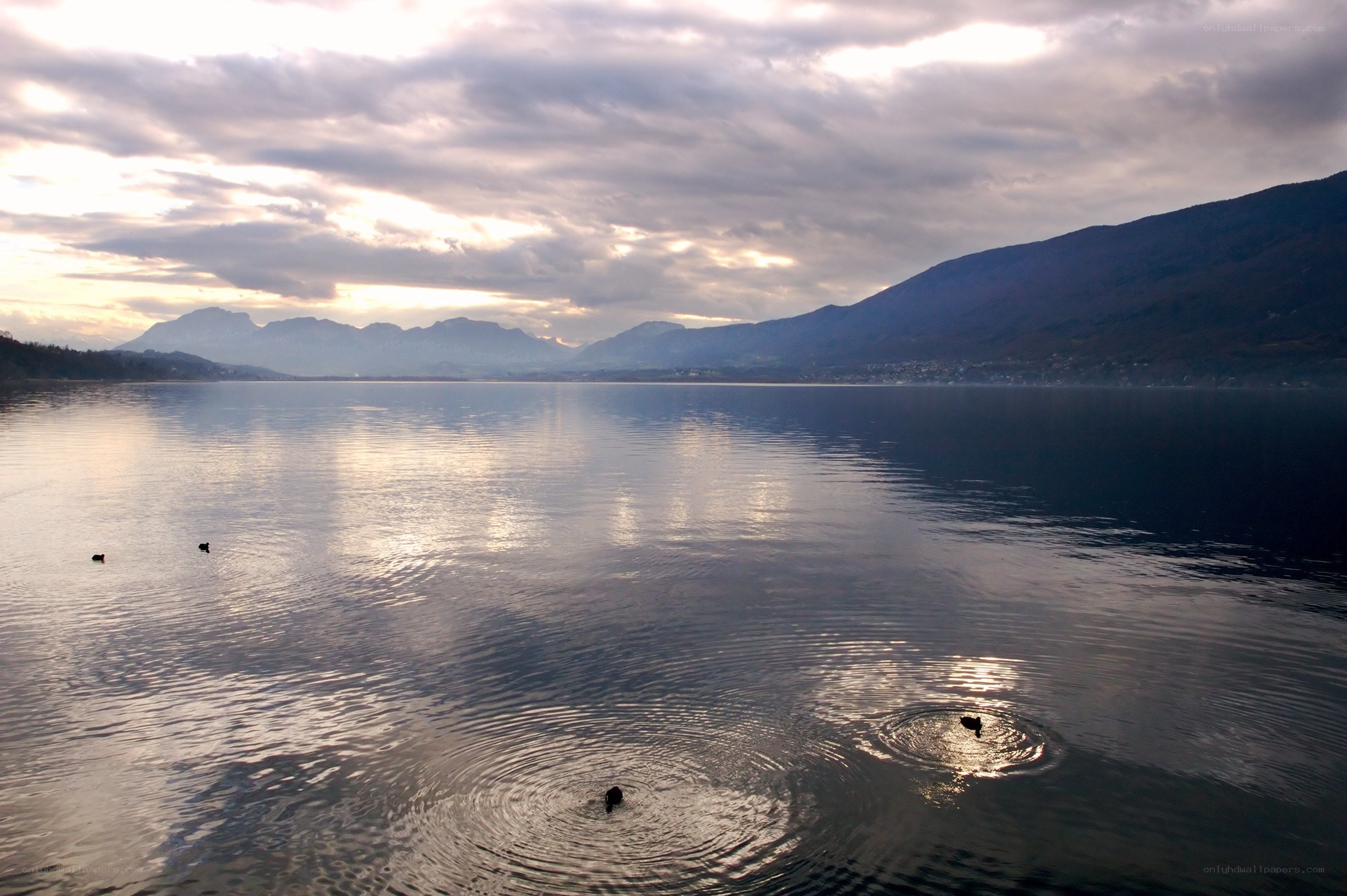 Lake with mountains at dusk
