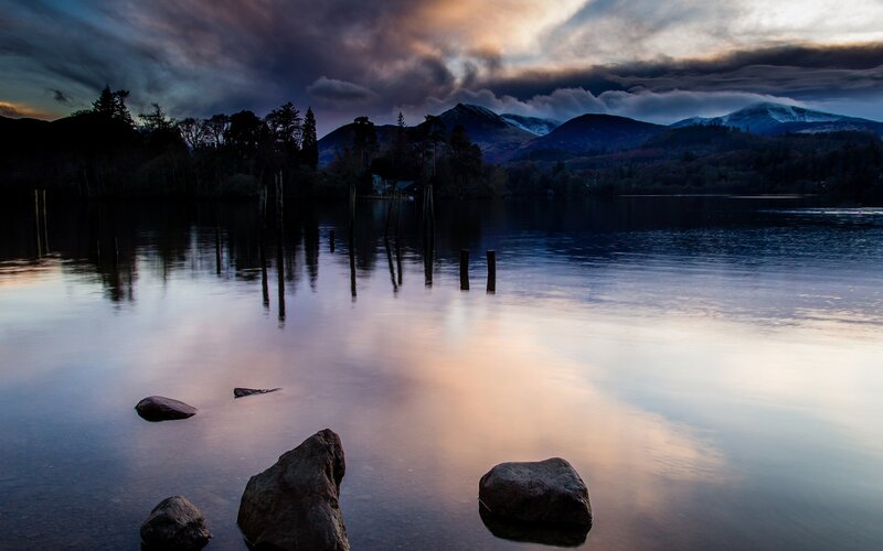 Lake with mountains at dusk