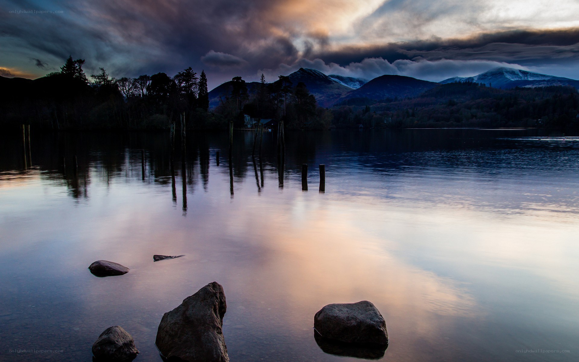 Lake with mountains at dusk
