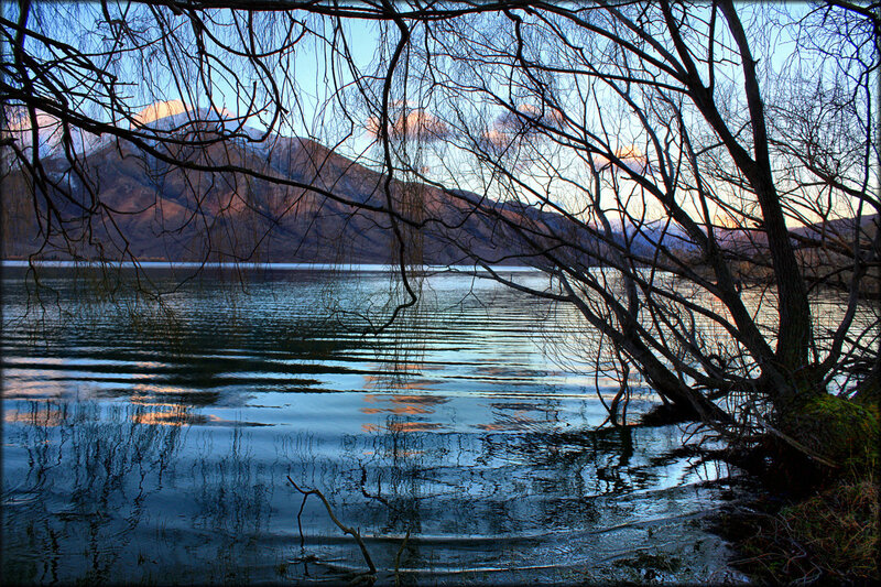 Lake with mountains at sunset