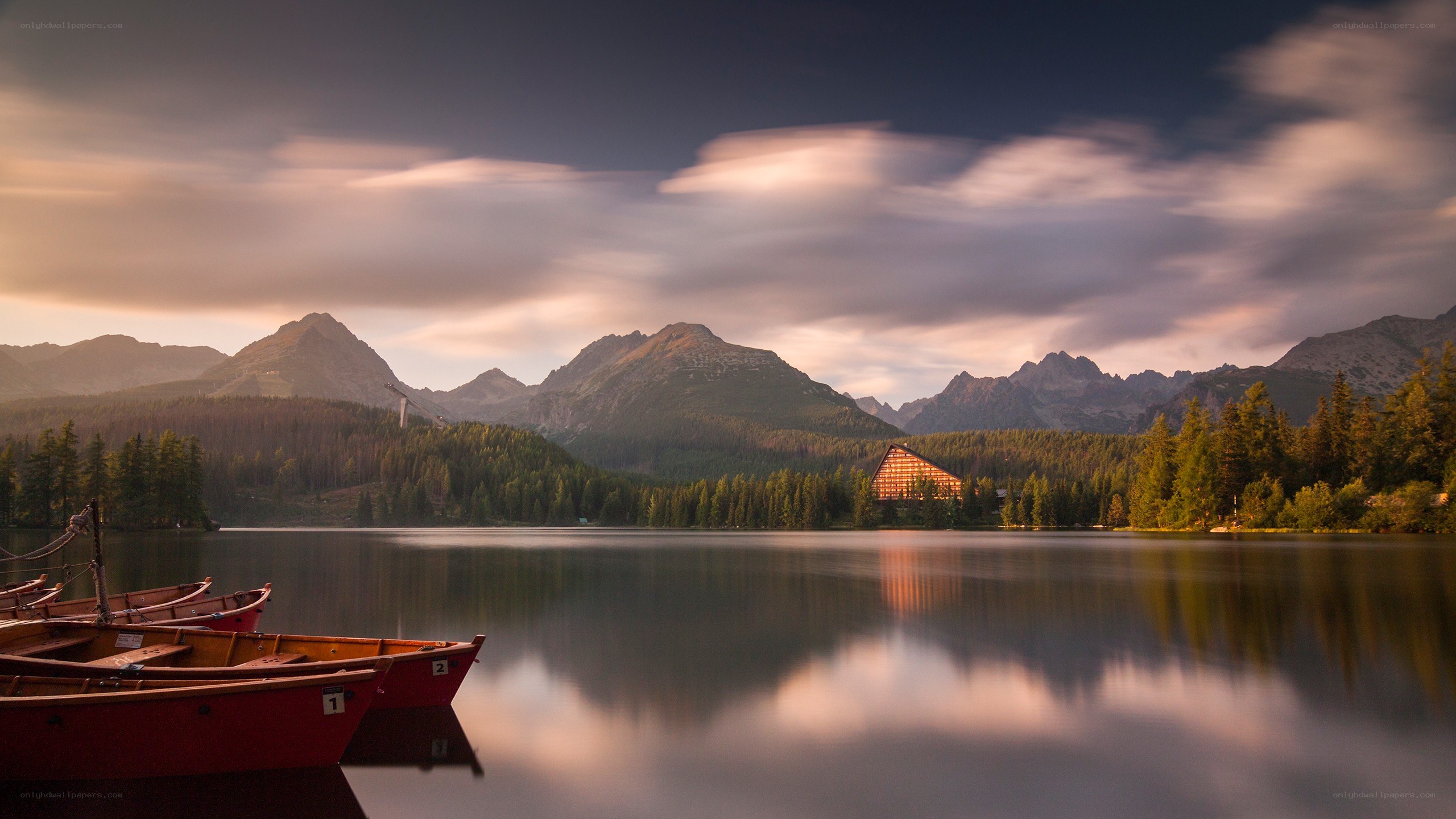 Lake with mountains at sunset